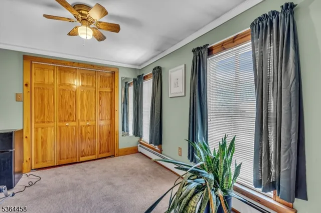 a view of entryway with livingroom