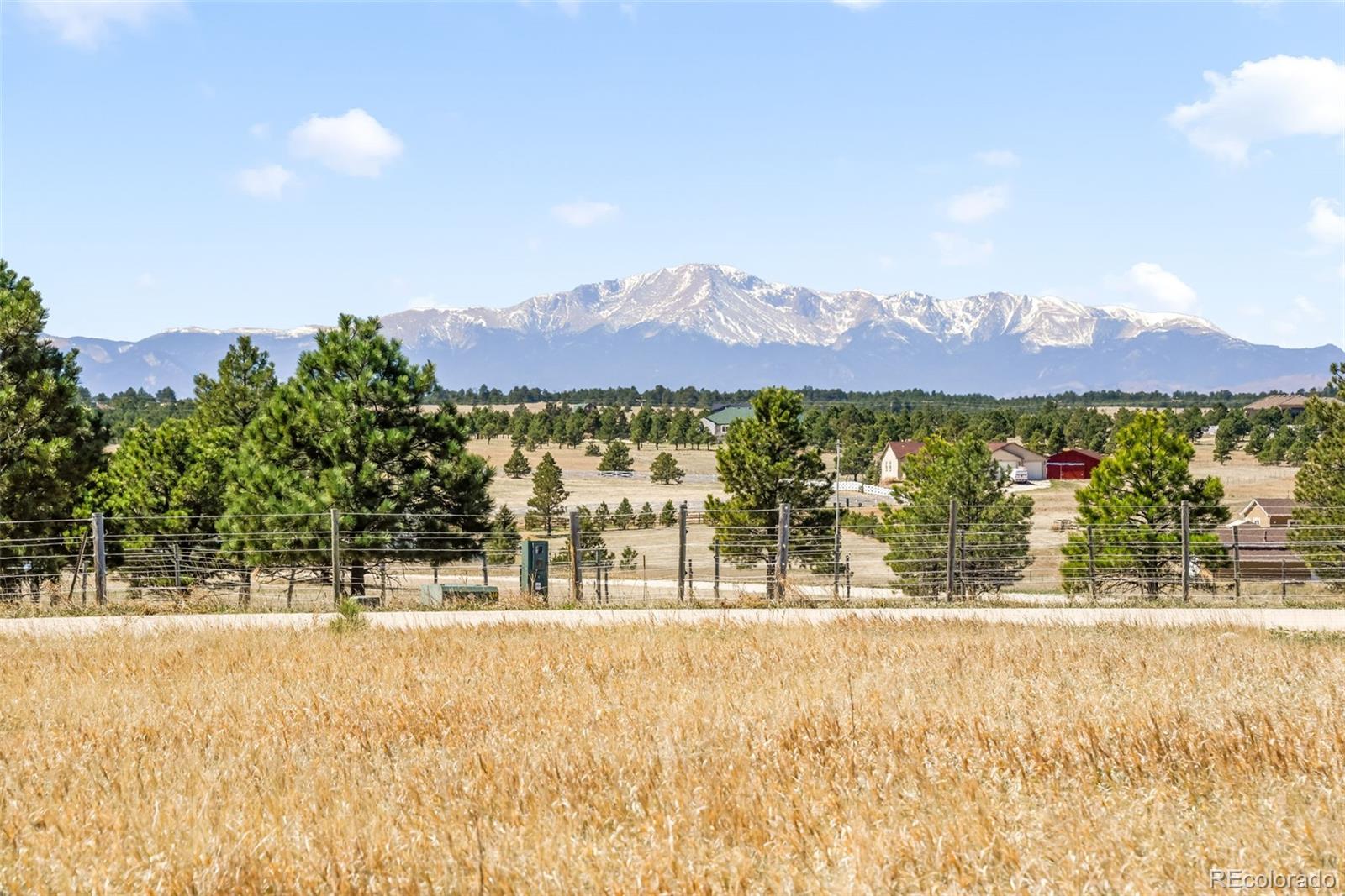 18150 Pinon Park Road Peyton, CO 80831 - Photo 3 of 45 a view of lake and a mountain