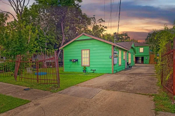 a front view of a house with a garage