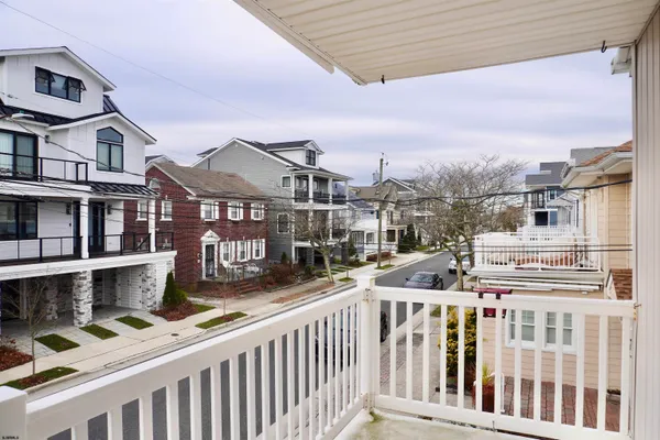 a view of a street from a balcony