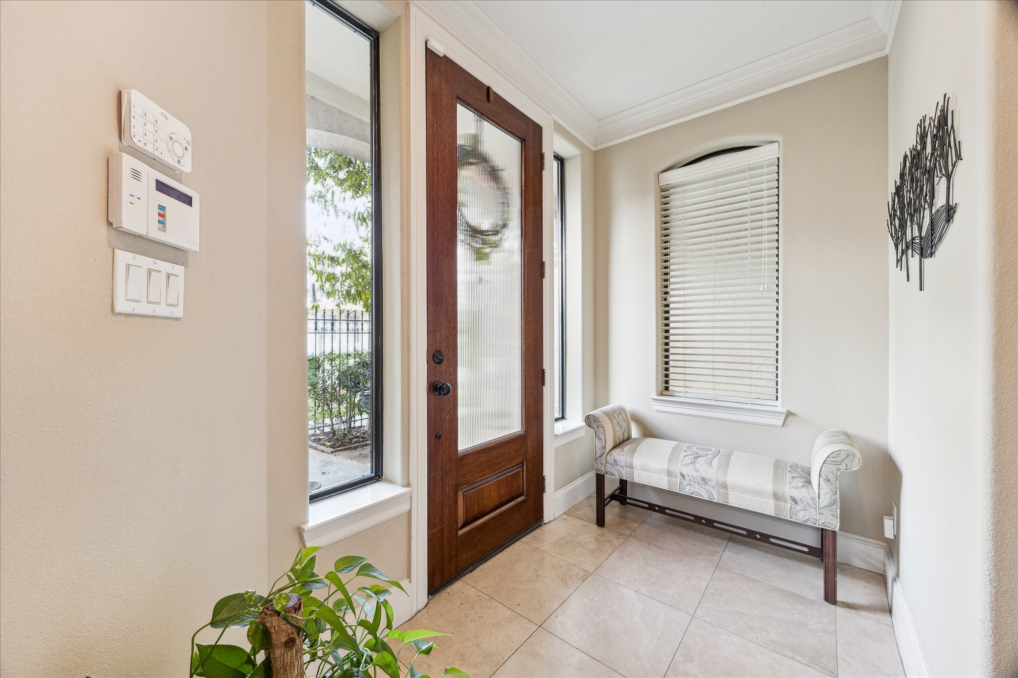 6311 Hamman Street, Unit A Houston, TX 77007 - Photo 4 of 30 a bedroom with a bed and a window