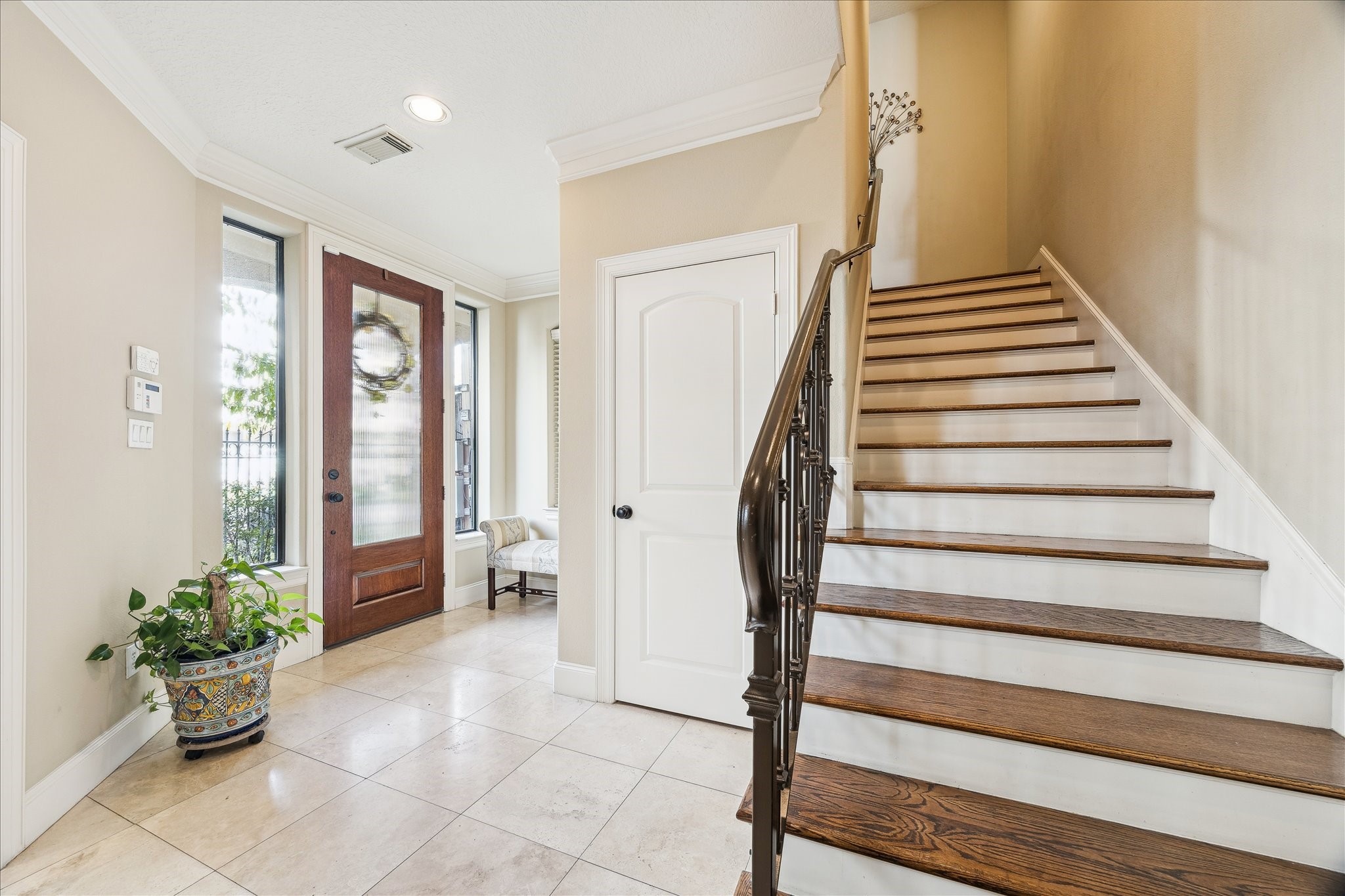 6311 Hamman Street, Unit A Houston, TX 77007 - Photo 5 of 30 a view of entryway and hall with wooden floor