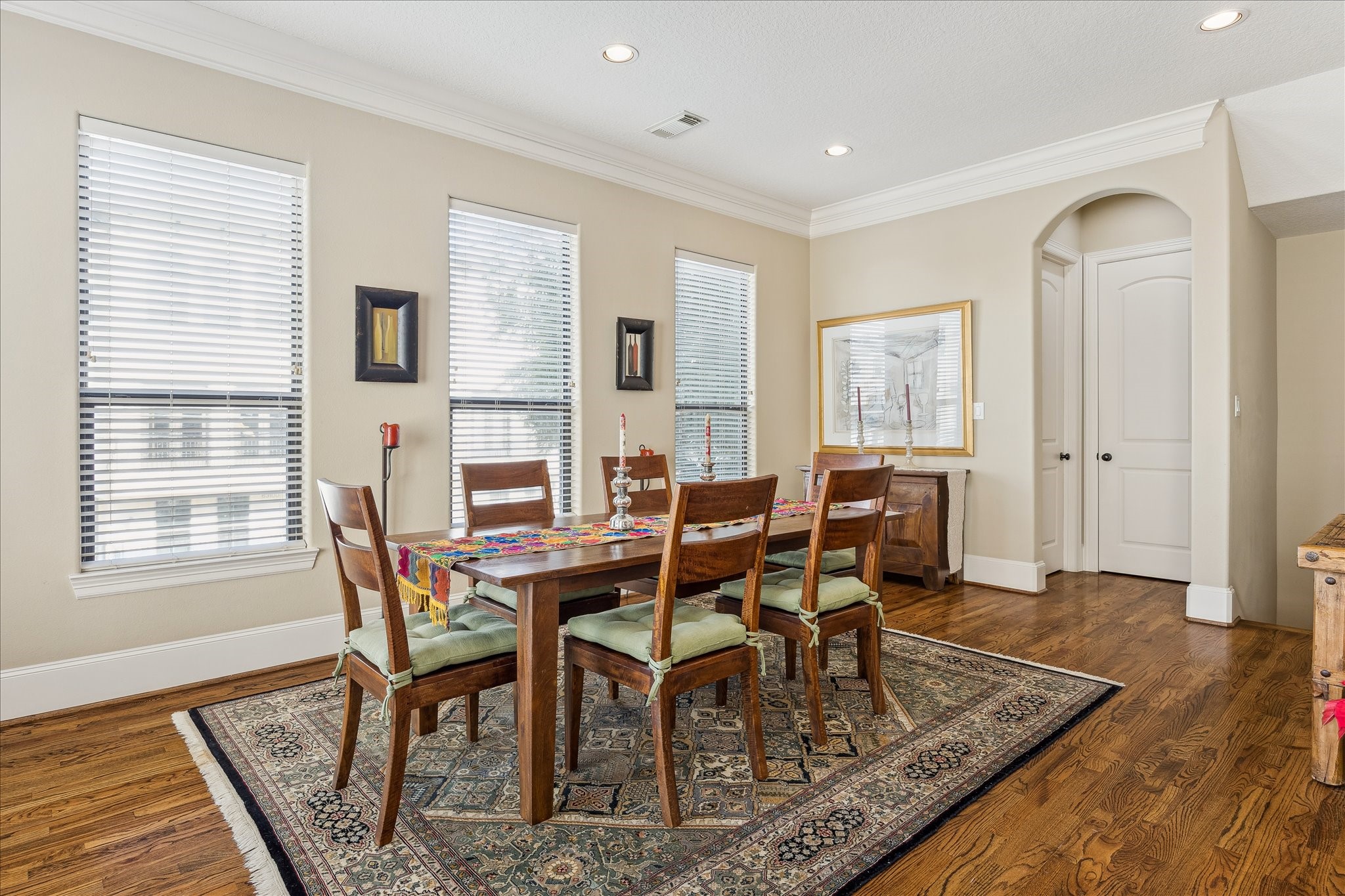 6311 Hamman Street, Unit A Houston, TX 77007 - Photo 9 of 30 a view of a dining room with furniture and wooden floor