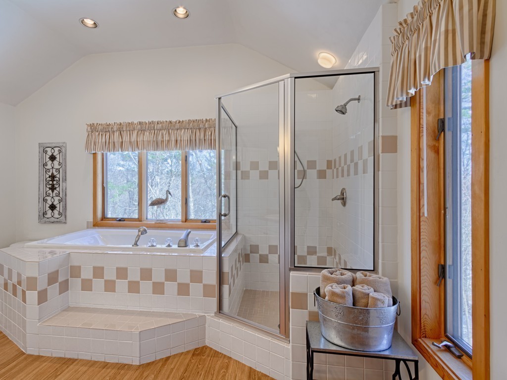 14 Skunk Road Merrimac, MA 01860 - Photo 15 of 25 a bathroom with a tub and a sink