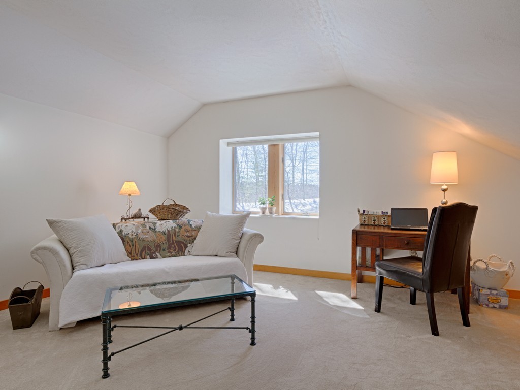 14 Skunk Road Merrimac, MA 01860 - Photo 18 of 25 a living room with furniture and a window