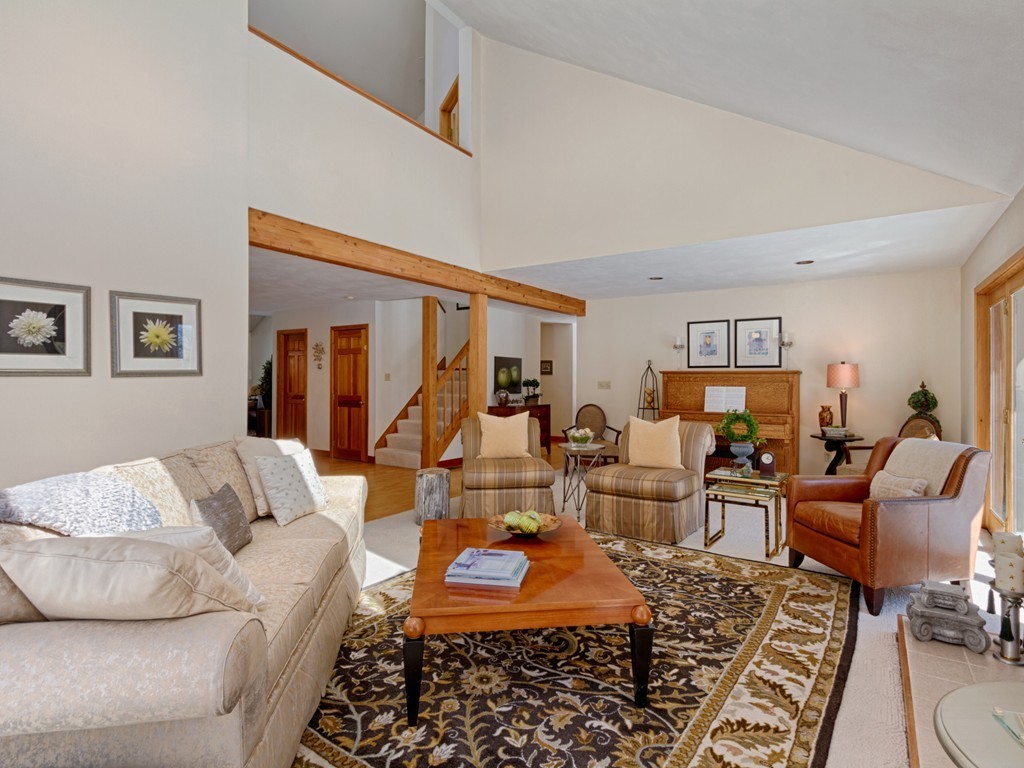 14 Skunk Road Merrimac, MA 01860 - Photo 5 of 25 a living room with furniture and a couch