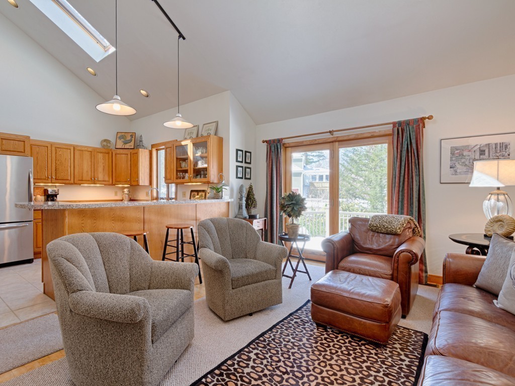 14 Skunk Road Merrimac, MA 01860 - Photo 7 of 25 a living room with furniture and a large window