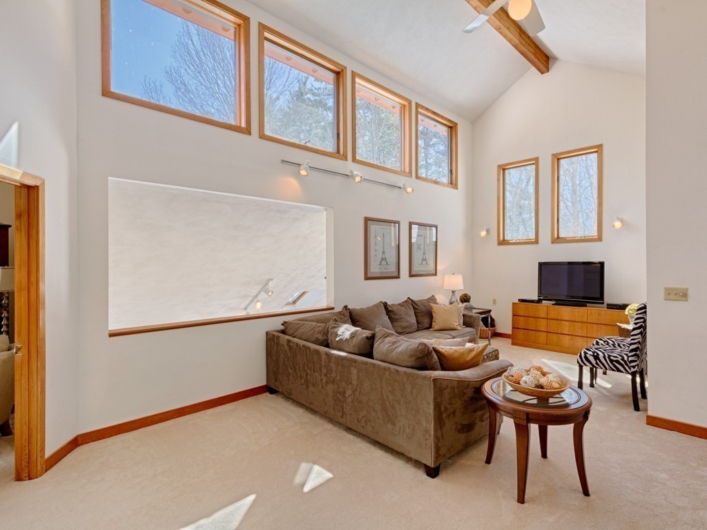 14 Skunk Road Merrimac, MA 01860 - Photo 10 of 25 a living room with furniture and a window