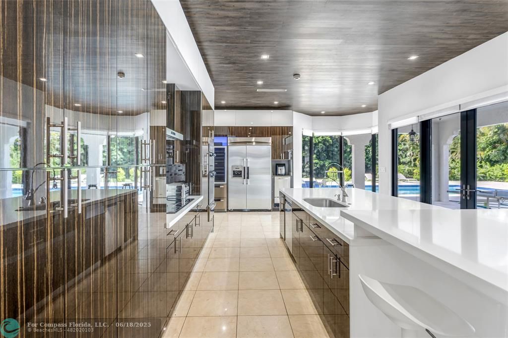 6901 Holatee Trail Southwest Ranches, FL 33330 - Photo 14 of 45 a large white building with glass windows