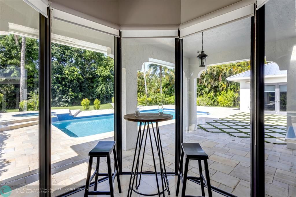 6901 Holatee Trail Southwest Ranches, FL 33330 - Photo 15 of 45 a view of a room with a large window and dining area
