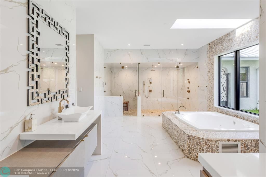 6901 Holatee Trail Southwest Ranches, FL 33330 - Photo 21 of 45 a spacious bathroom with a tub shower and sink