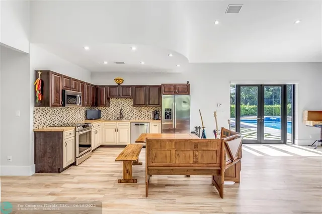 a living room with granite countertop furniture and a fireplace