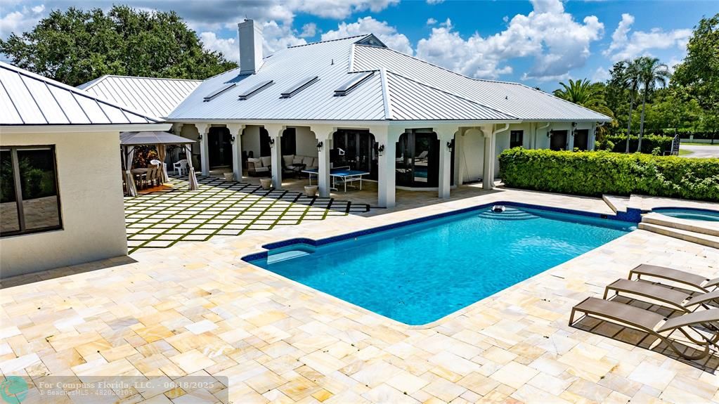 6901 Holatee Trail Southwest Ranches, FL 33330 - Photo 40 of 45 a view of a house with pool and chairs