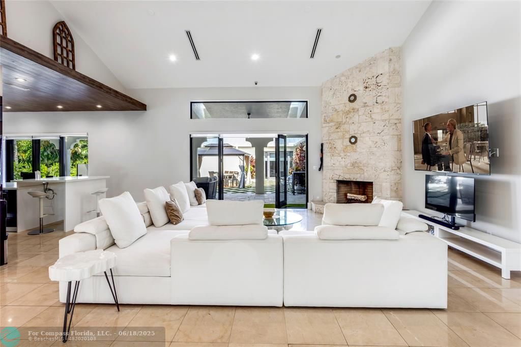 6901 Holatee Trail Southwest Ranches, FL 33330 - Photo 10 of 45 a living room with furniture and a fireplace