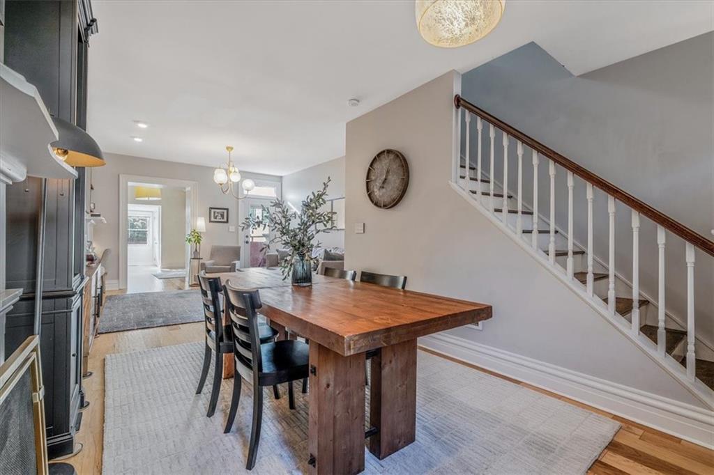 1417 Monterey Street Pittsburgh, PA 15212 - Photo 6 of 50 a view of a dining room and kitchen with furniture and a table