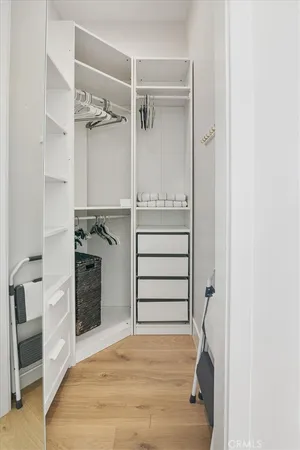 a kitchen with a sink a stove and cabinets