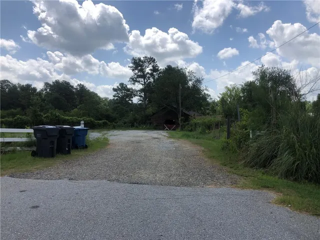 a view of a backyard of a house
