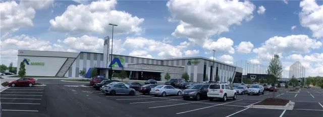 a view of roof with wooden fence