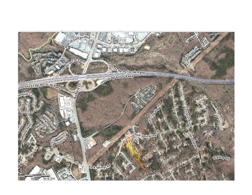 1405 Rock Springs Road Buford, GA 30519 - Photo 8 of 45 a black and white photo of a house