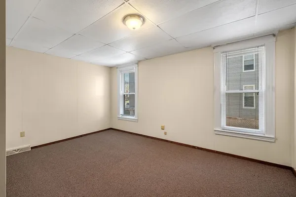 an empty room with windows