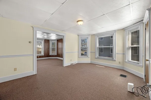 an empty room with windows