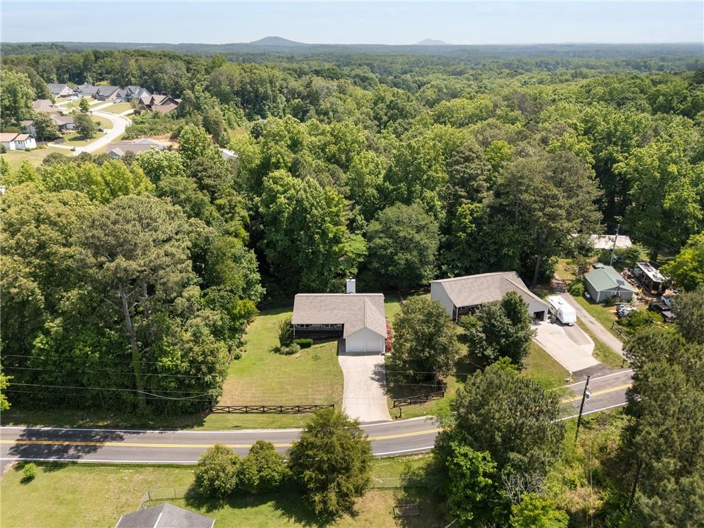 921 Pace Road Hiram, GA 30141 - Photo 40 of 41 a view of a swimming pool and trees in the background