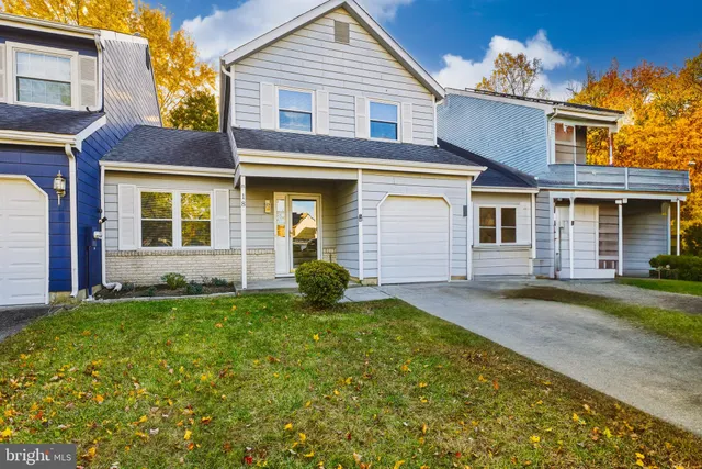 front view of a house and a yard