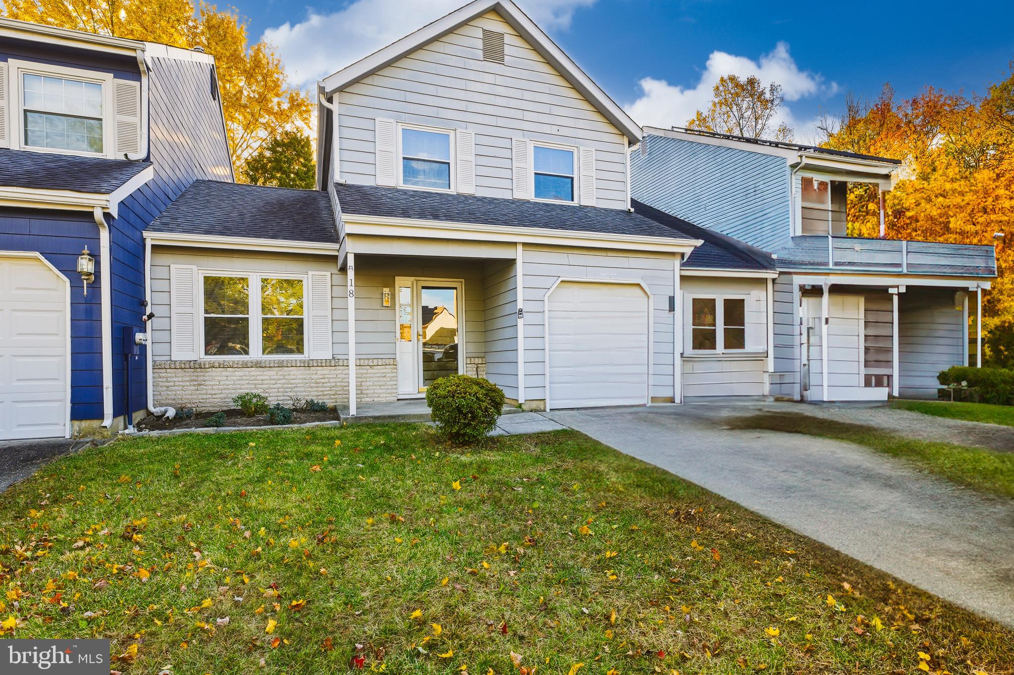 front view of a house and a yard
