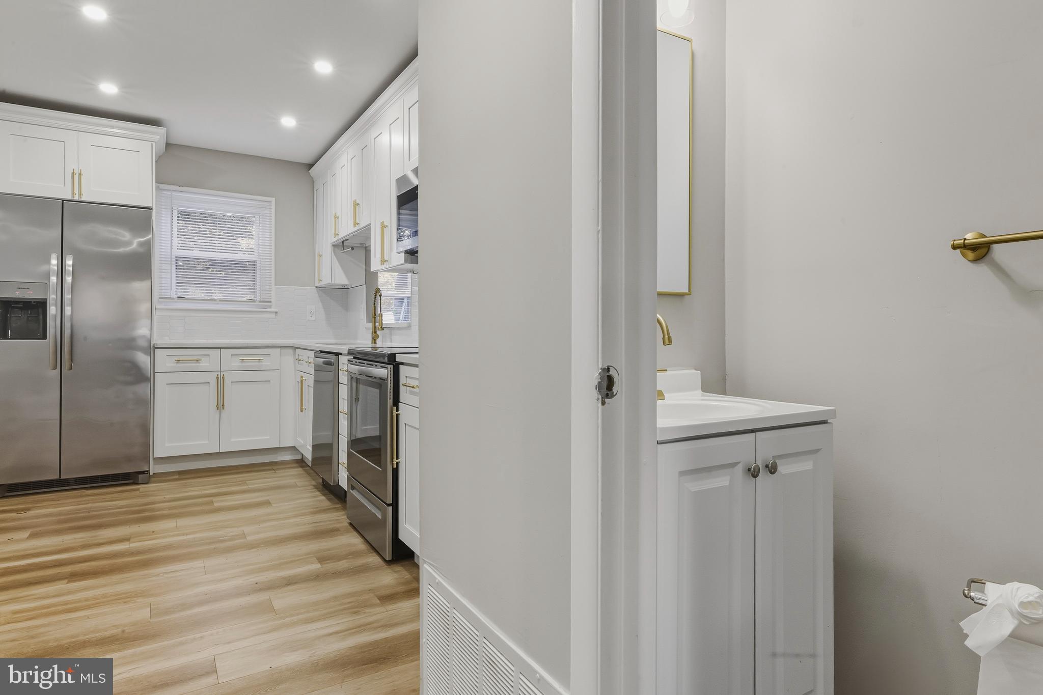 18 Madison Street Swedesboro, NJ 08085 - Photo 5 of 26 Kitchen & Half bath