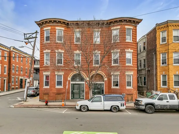 a car parked in front of a building