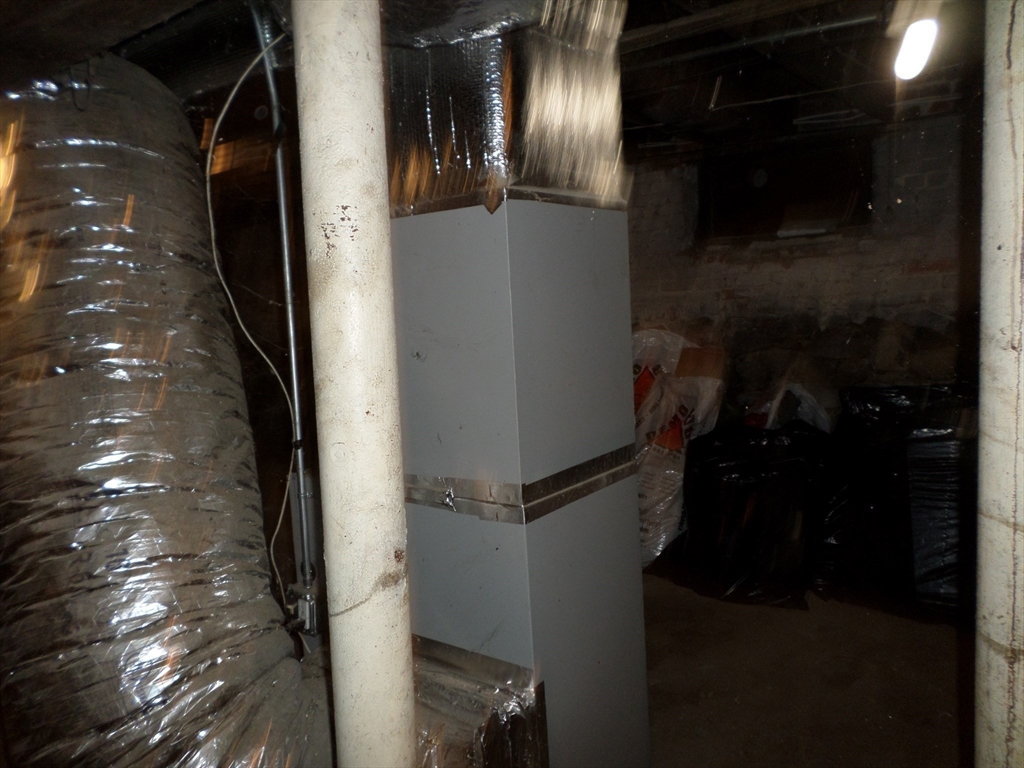 139 Hawthorne Street Chelsea, MA 02150 - Photo 16 of 17 a close view of water heater room