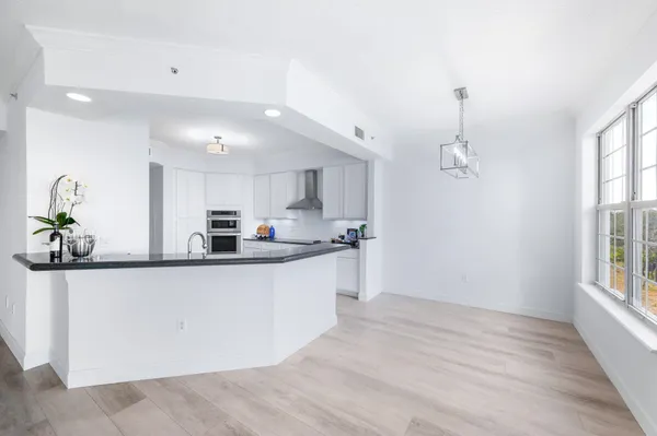 a view of a bathroom with a glass door shower