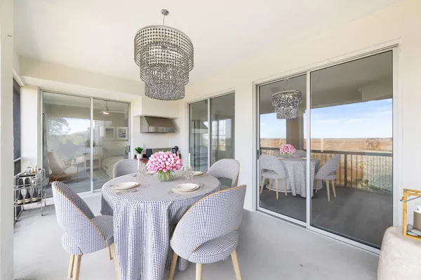 a view of multiple houses with a street