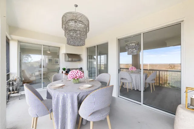 a view of multiple houses with a street