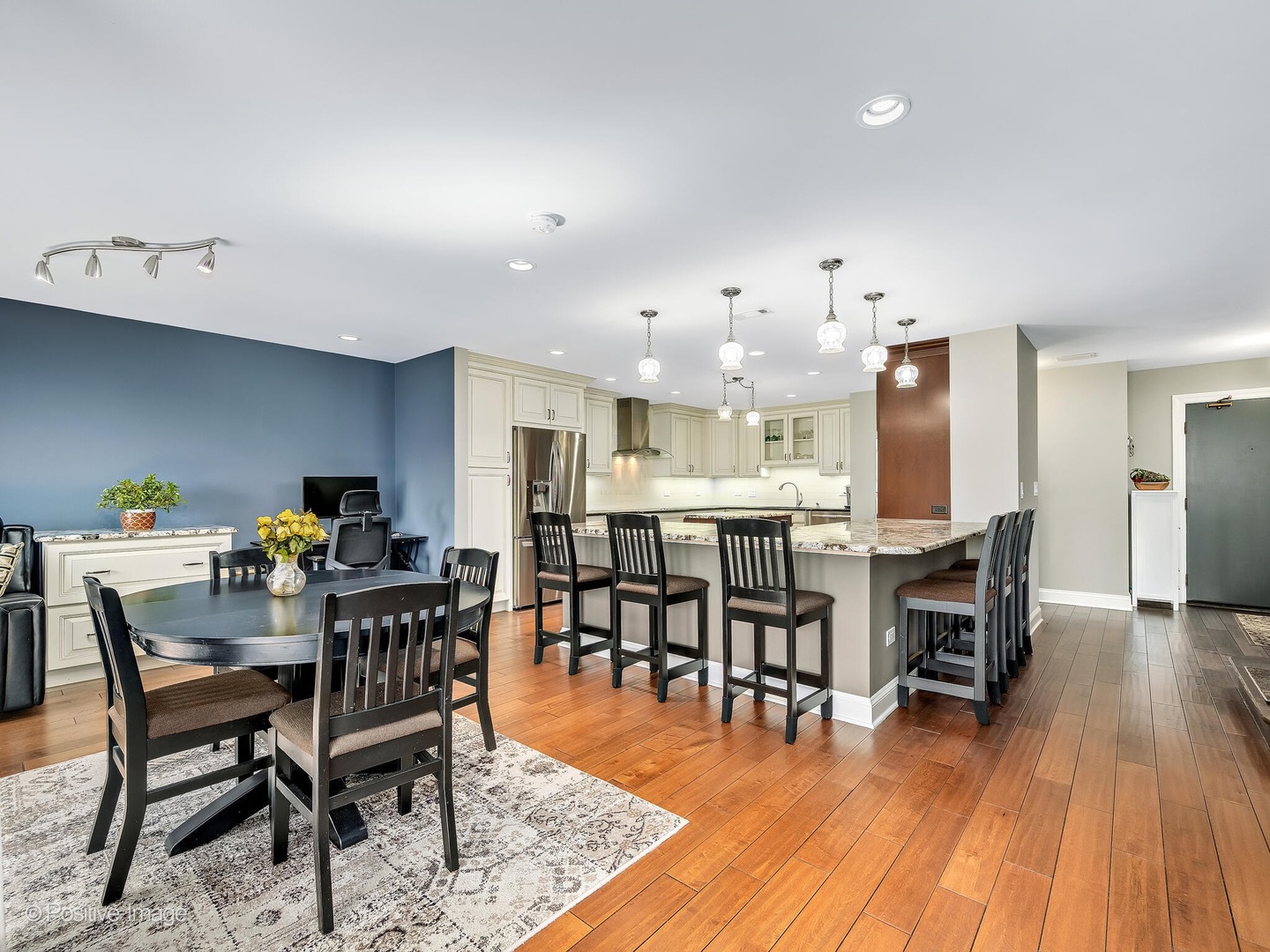 1401 Burr Oak Road, Unit 114B Hinsdale, IL 60521 - Photo 12 of 40 a view of a dining room with furniture and wooden floor