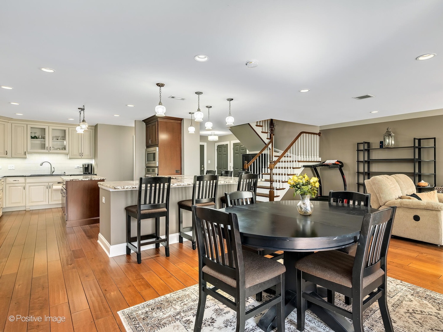 1401 Burr Oak Road, Unit 114B Hinsdale, IL 60521 - Photo 13 of 40 a dining room with furniture and wooden floor