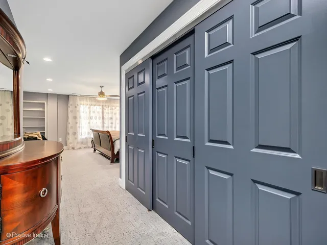 a view of a livingroom with furniture and windows