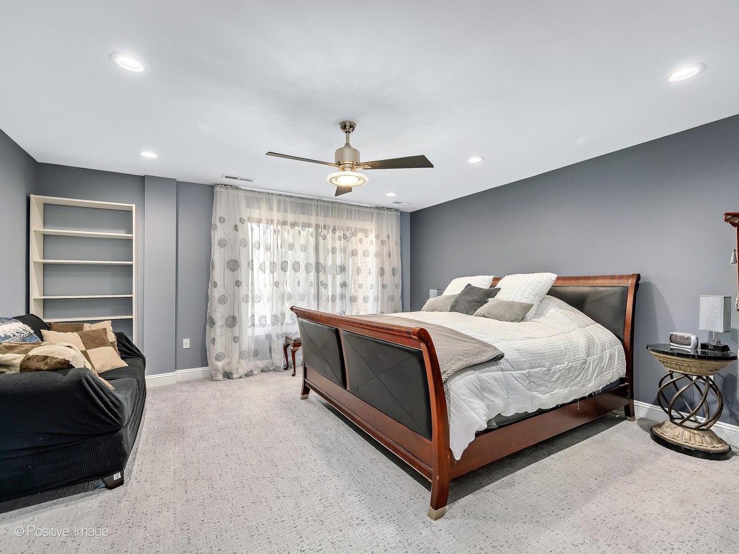 1401 Burr Oak Road, Unit 114B Hinsdale, IL 60521 - Photo 23 of 40 a large bedroom with a bed and window