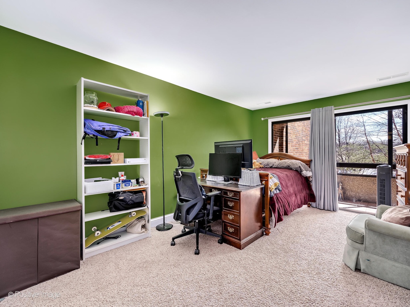 1401 Burr Oak Road, Unit 114B Hinsdale, IL 60521 - Photo 28 of 40 a bedroom with bed and a flat tv screen next to a window