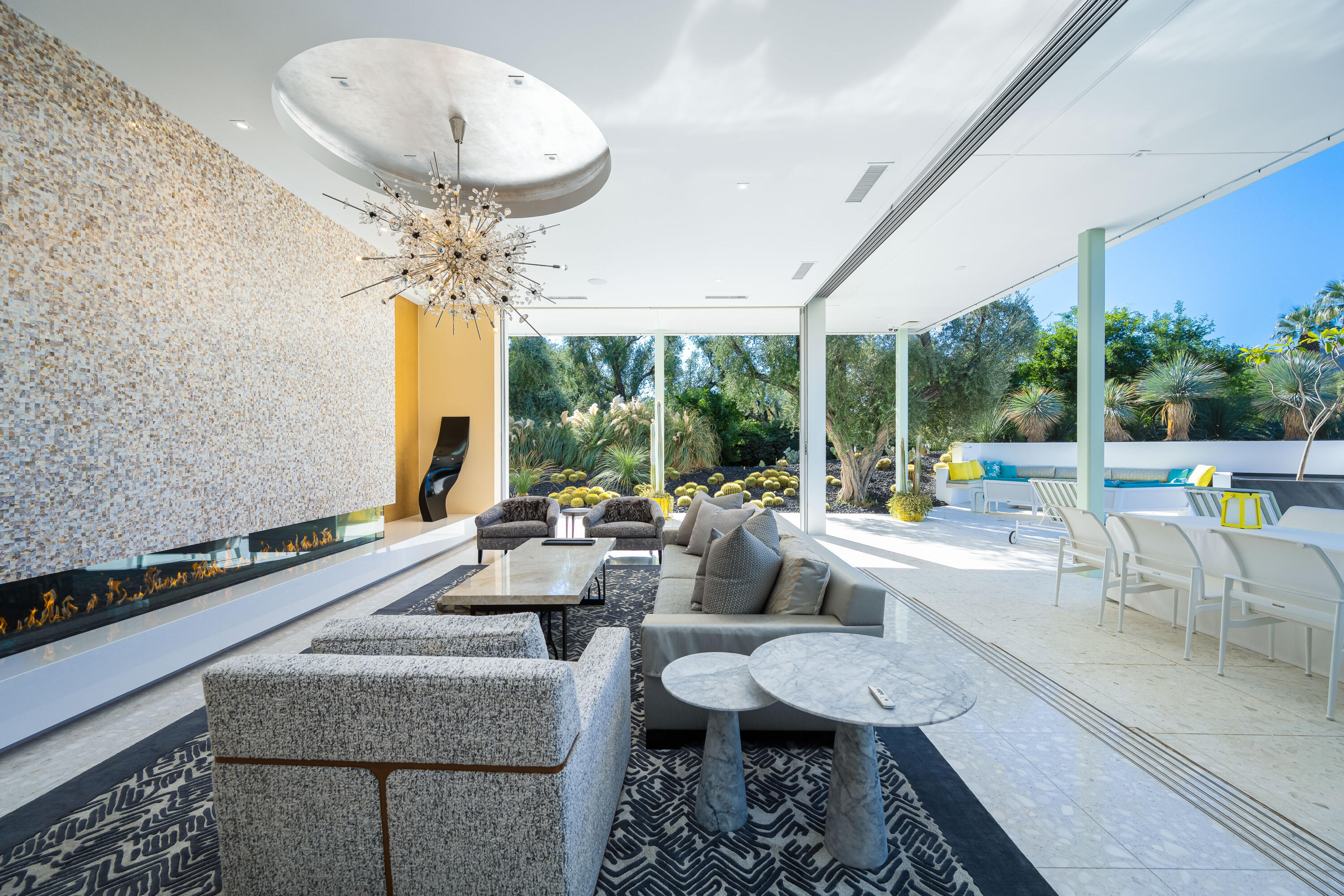 40365 Sand Dune Road Rancho Mirage, CA 92270 - Photo 12 of 70 a very nice looking living room with a large window and chandelier