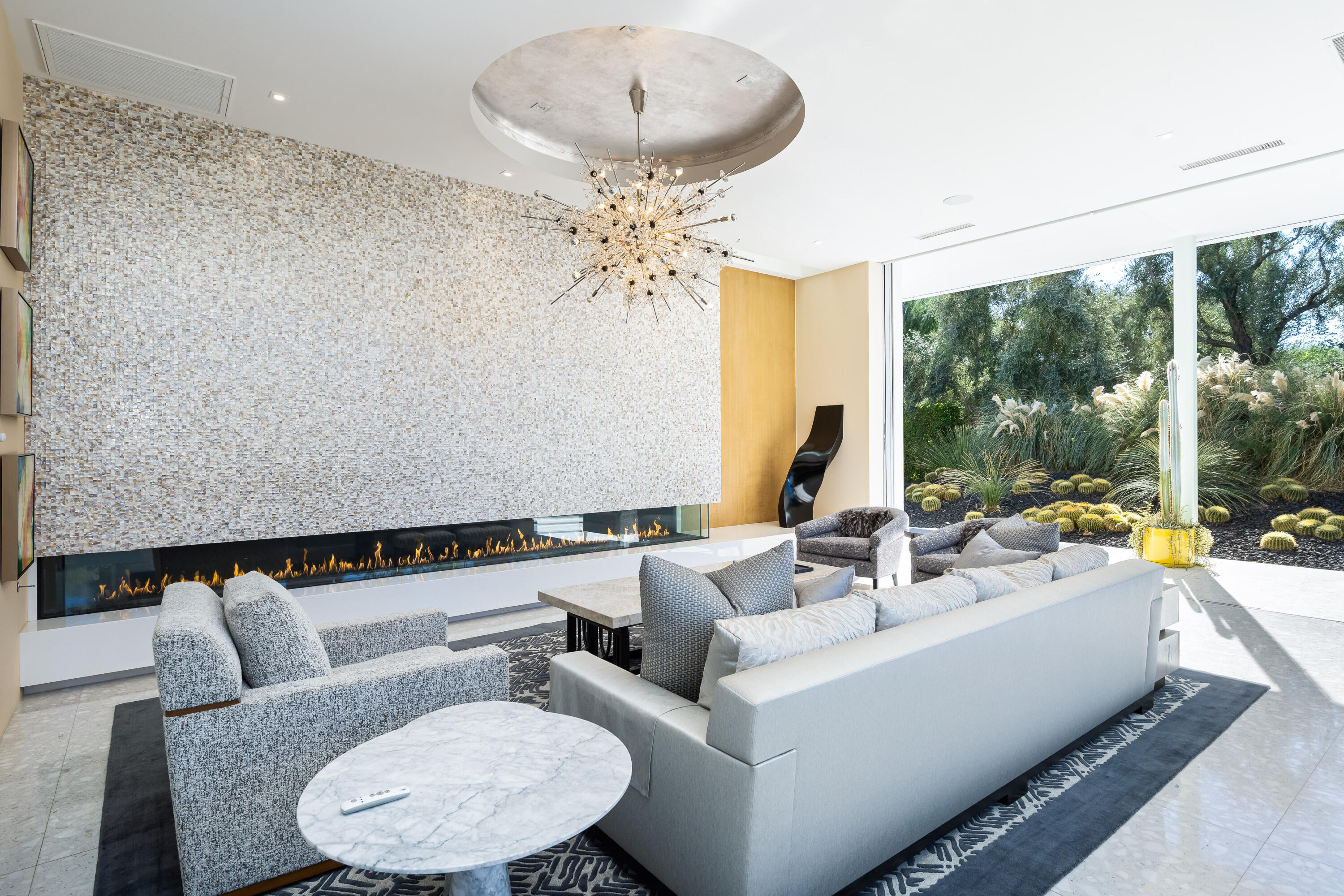 40365 Sand Dune Road Rancho Mirage, CA 92270 - Photo 13 of 70 a living room with furniture and a large window