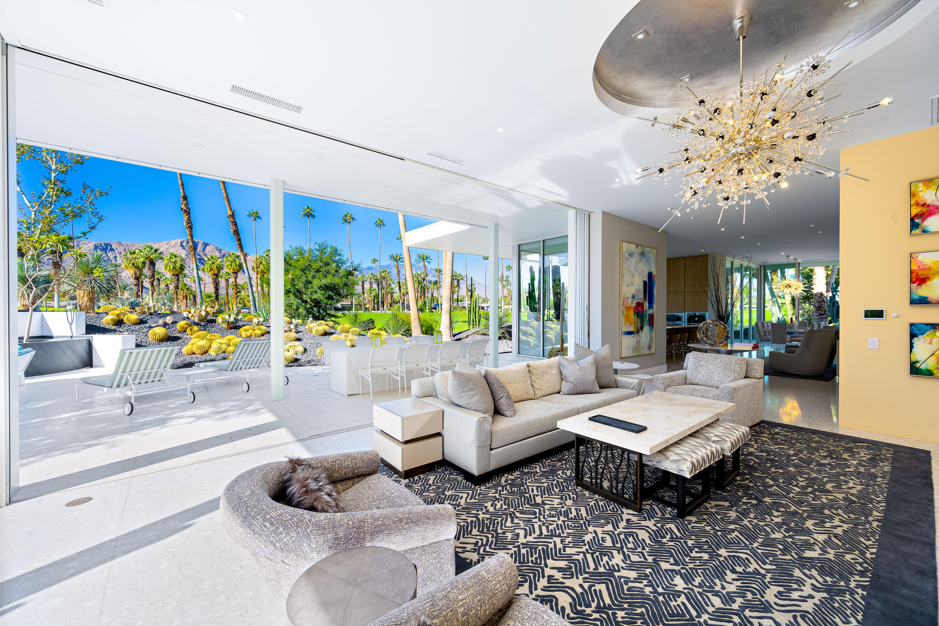 40365 Sand Dune Road Rancho Mirage, CA 92270 - Photo 14 of 70 a living room with patio furniture and a large window