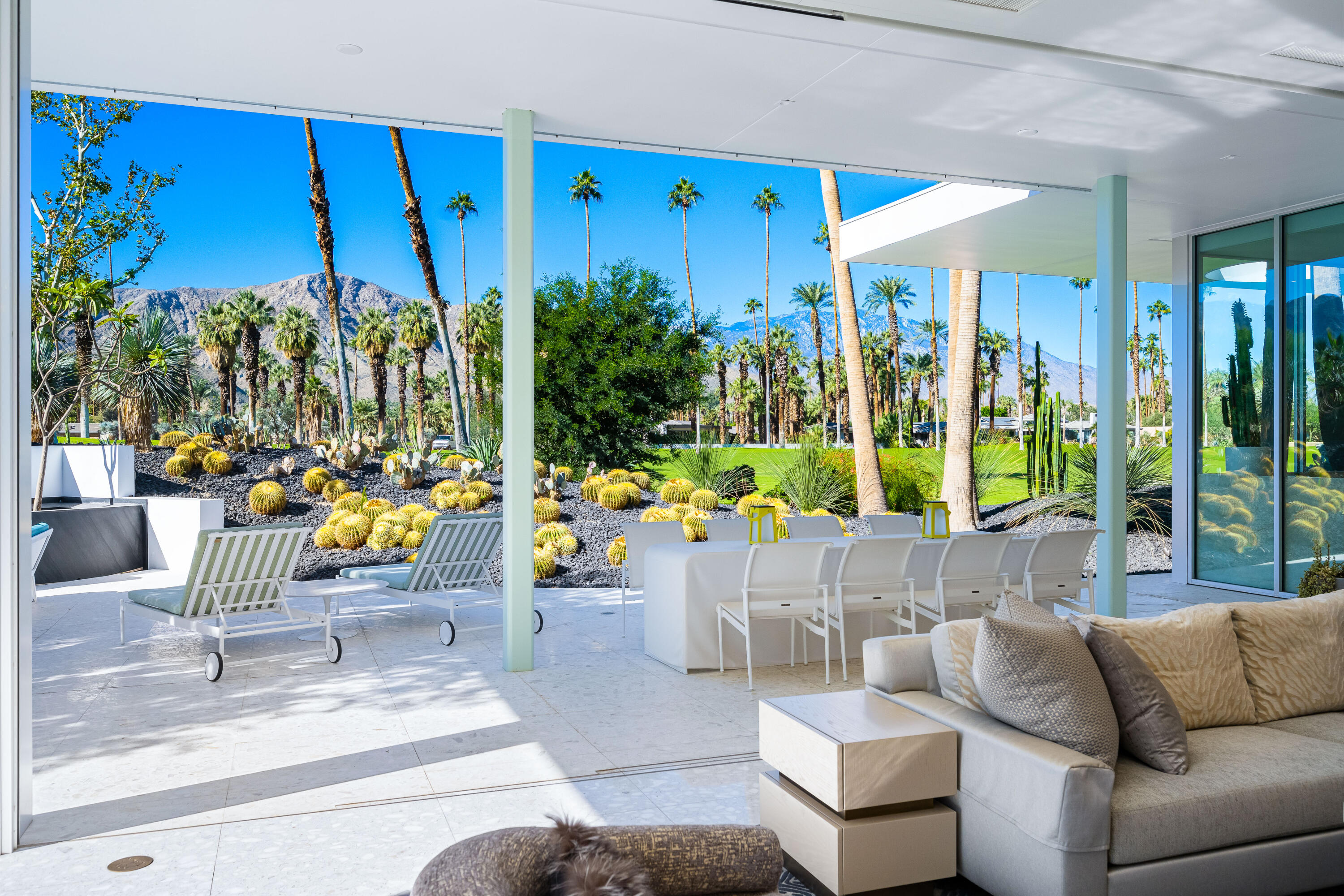 40365 Sand Dune Road Rancho Mirage, CA 92270 - Photo 18 of 70 a living room with patio furniture and a potted plant