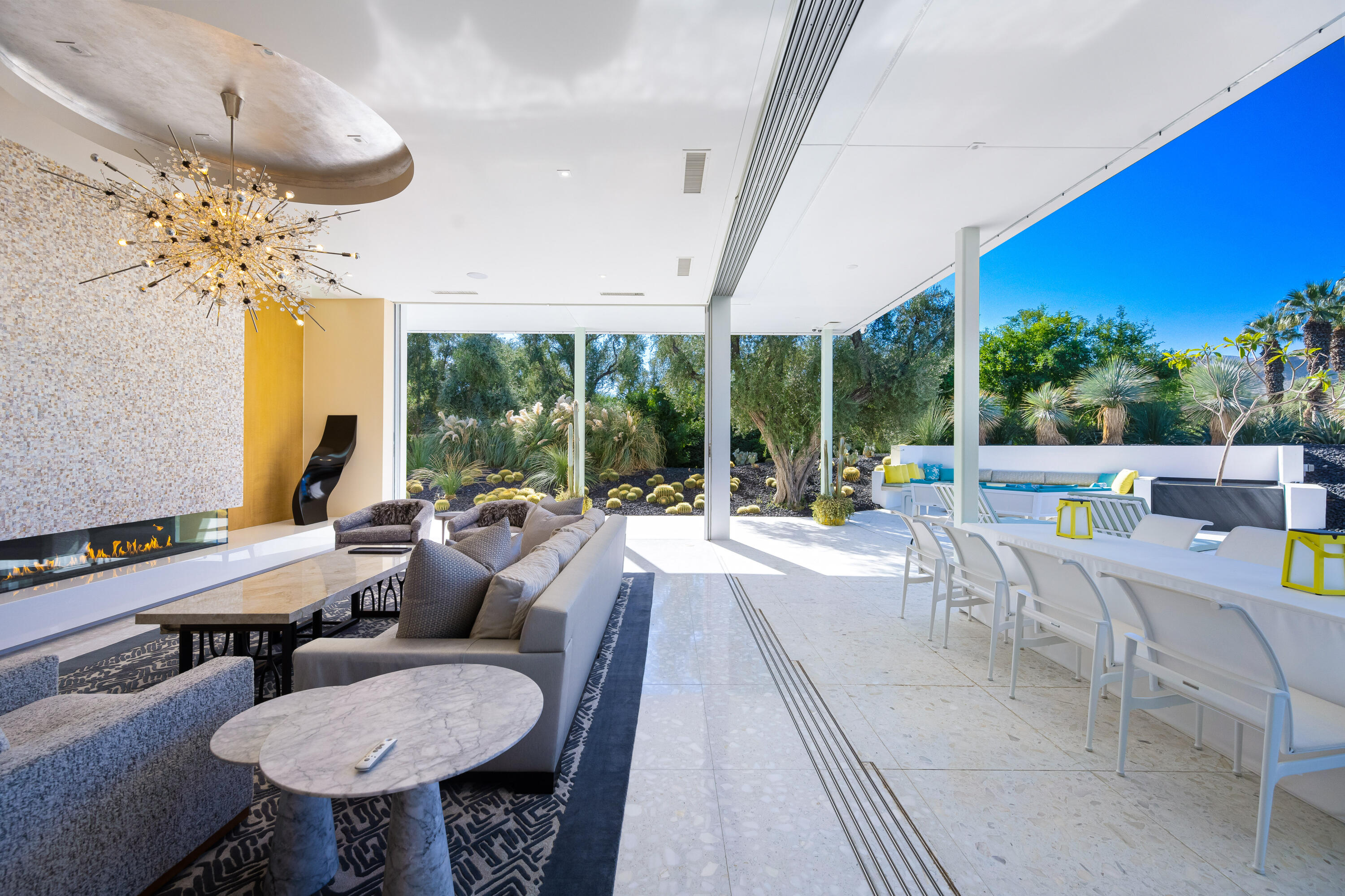 40365 Sand Dune Road Rancho Mirage, CA 92270 - Photo 19 of 70 a living room with furniture and a large window
