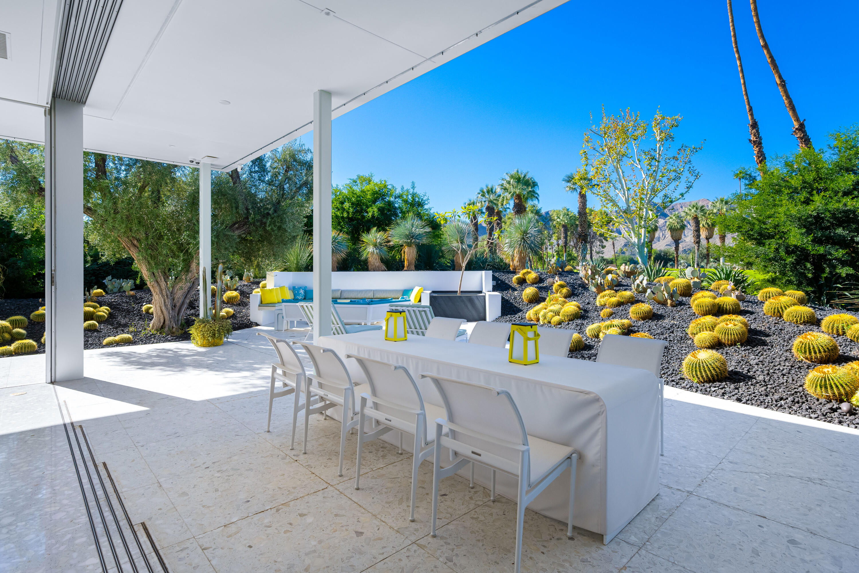 40365 Sand Dune Road Rancho Mirage, CA 92270 - Photo 20 of 70 a outdoor dining space with furniture and a potted plant