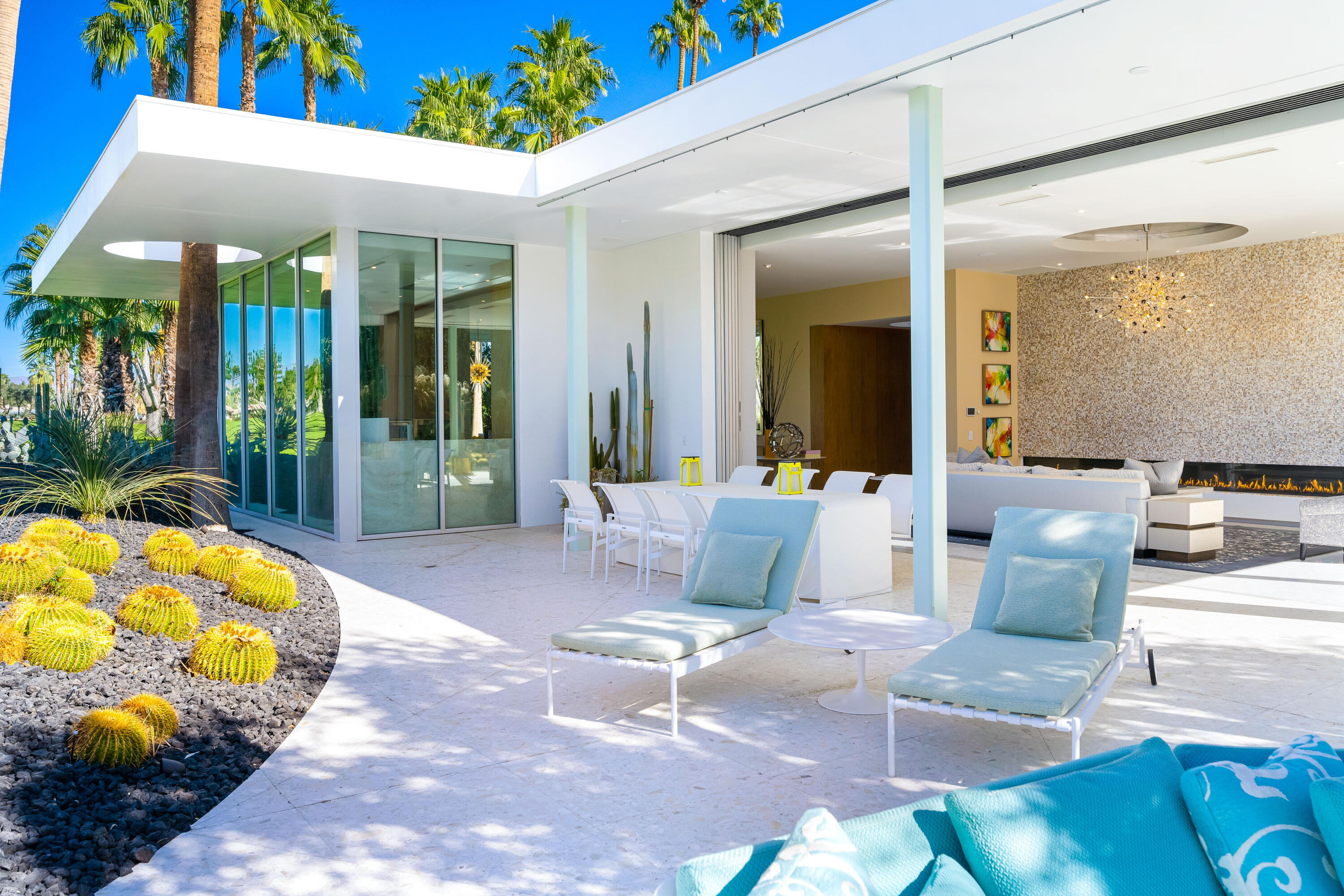 40365 Sand Dune Road Rancho Mirage, CA 92270 - Photo 25 of 70 a view of a patio with swimming pool table and chairs