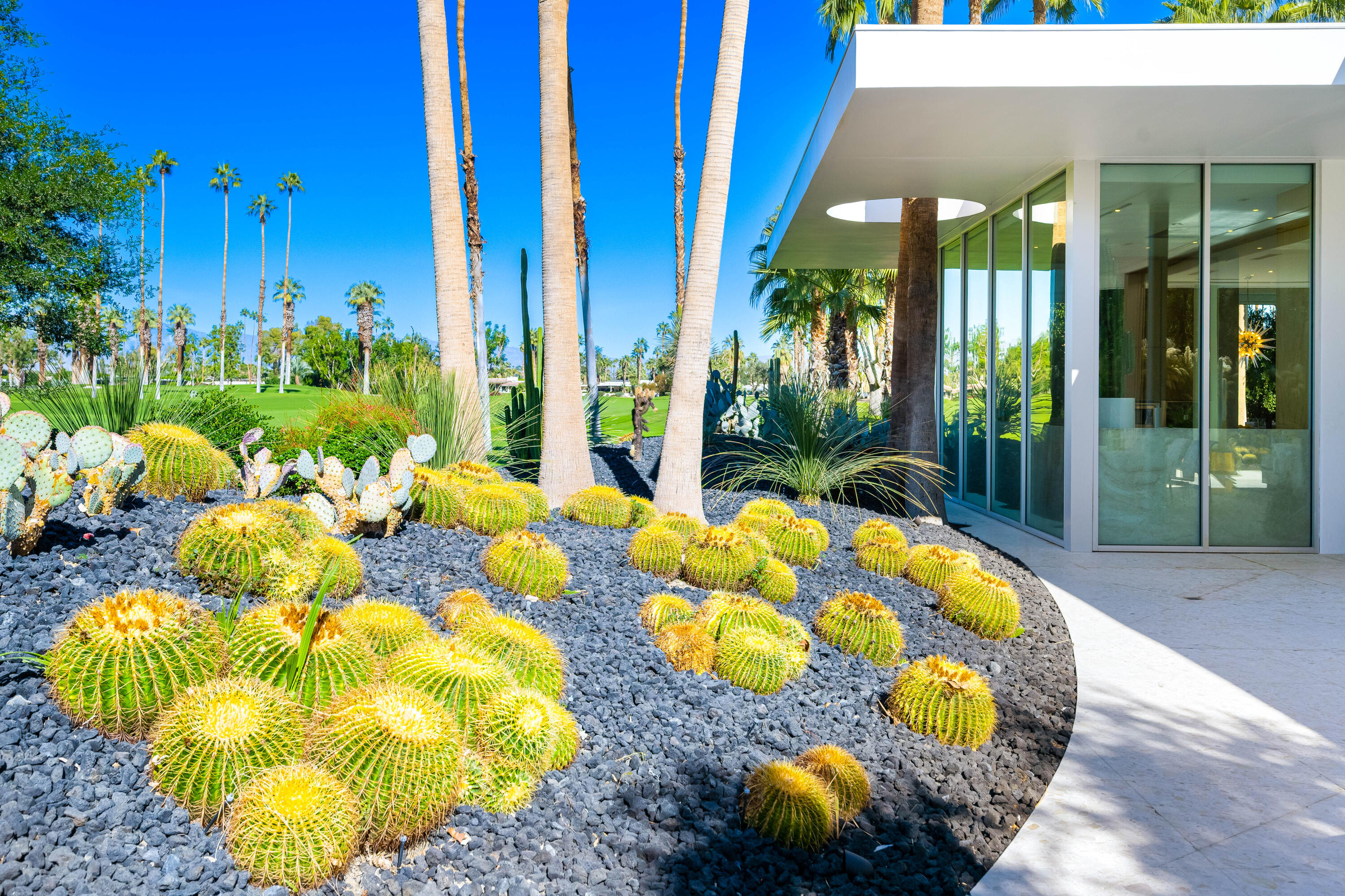 40365 Sand Dune Road Rancho Mirage, CA 92270 - Photo 26 of 70 a view of a swimming pool with outdoor seating