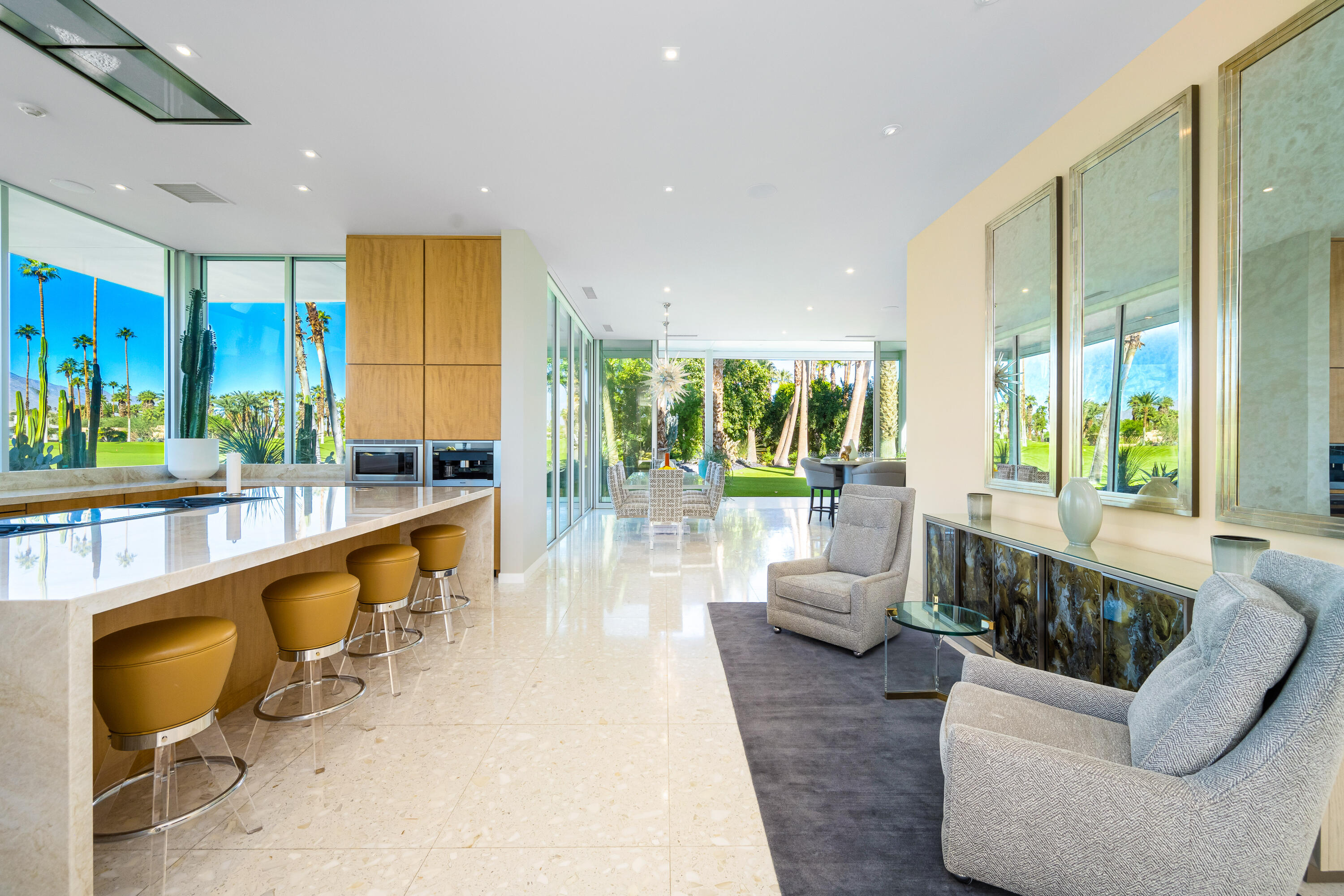 40365 Sand Dune Road Rancho Mirage, CA 92270 - Photo 27 of 70 a large living room with large windows