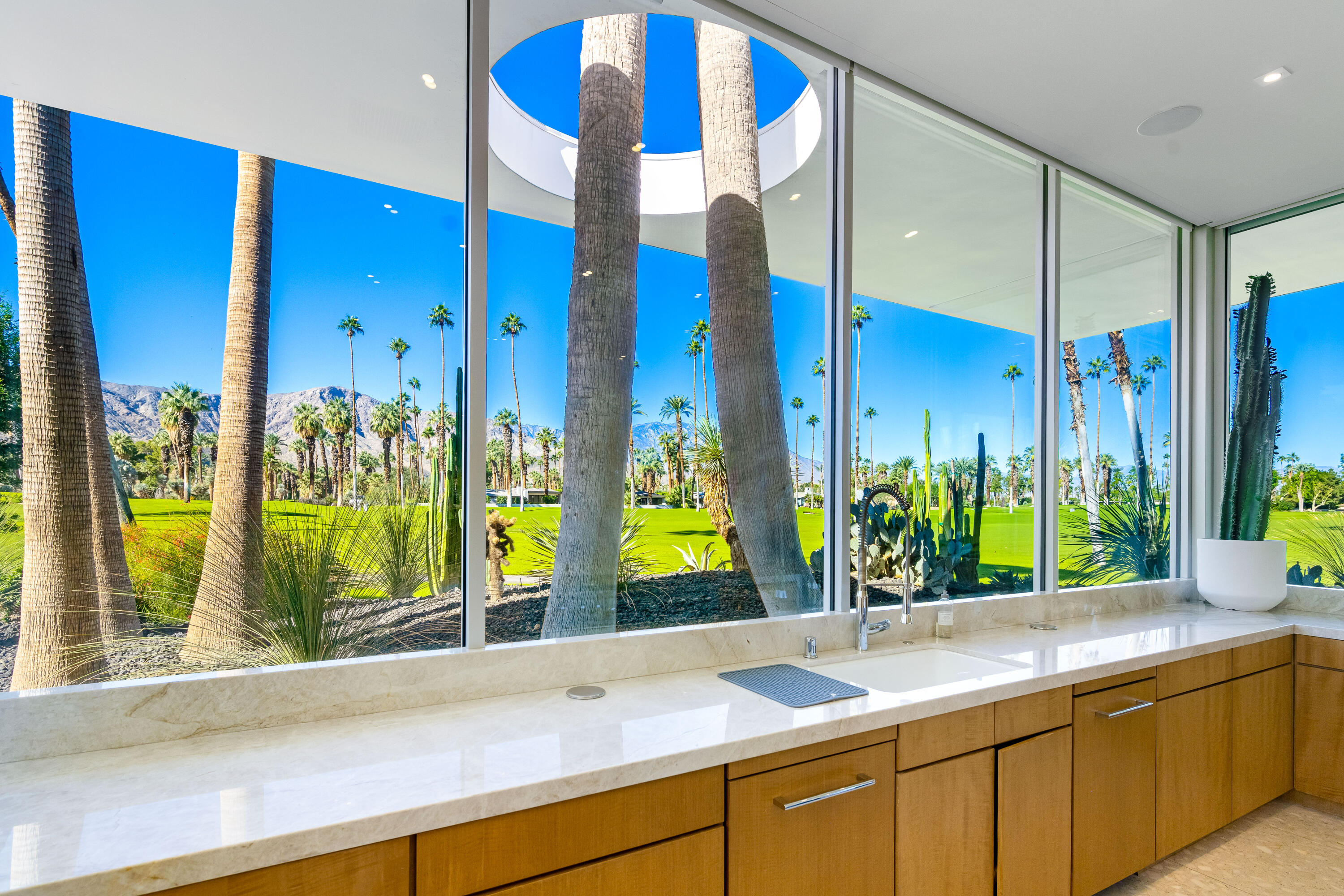 40365 Sand Dune Road Rancho Mirage, CA 92270 - Photo 30 of 70 a bathroom with a sink and a large window