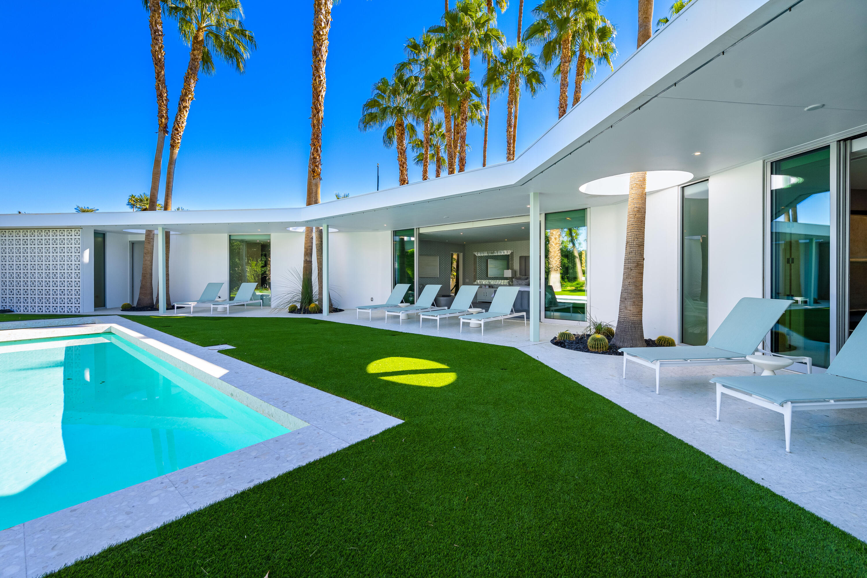 40365 Sand Dune Road Rancho Mirage, CA 92270 - Photo 43 of 70 a view of an house with swimming pool and porch